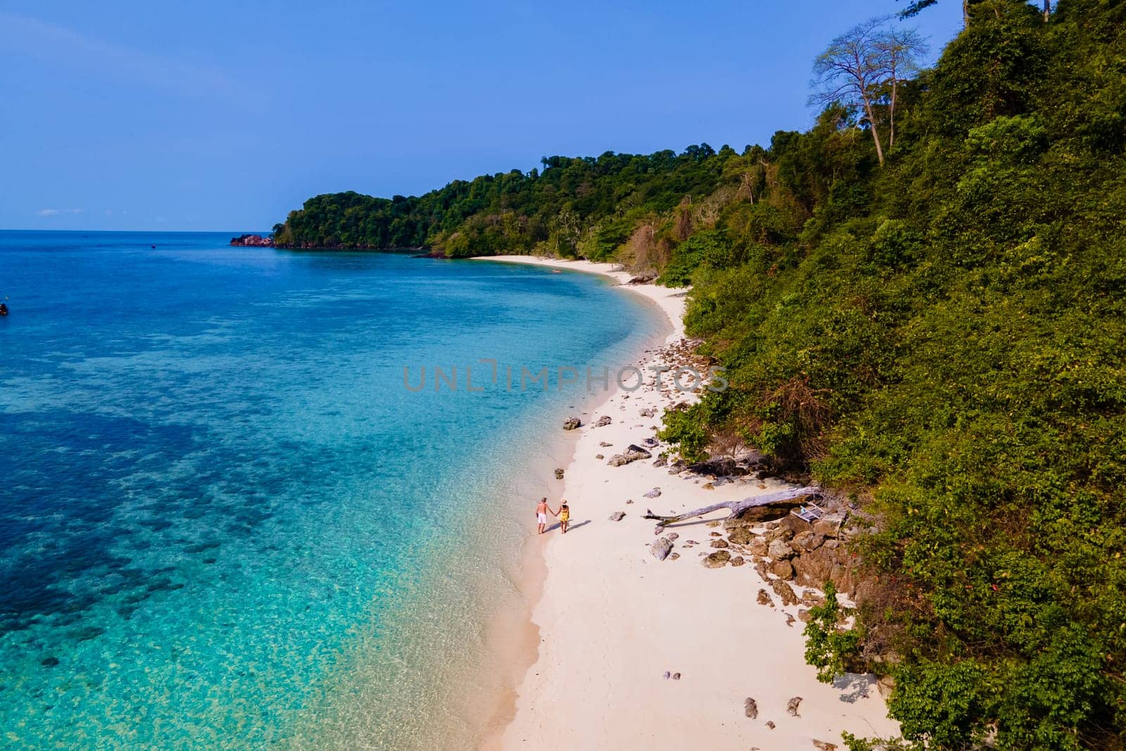 drone view at the beach of Koh Kradan island in Thailand, aerial view over Koh Kradan Island Trang during vacation in Thailand