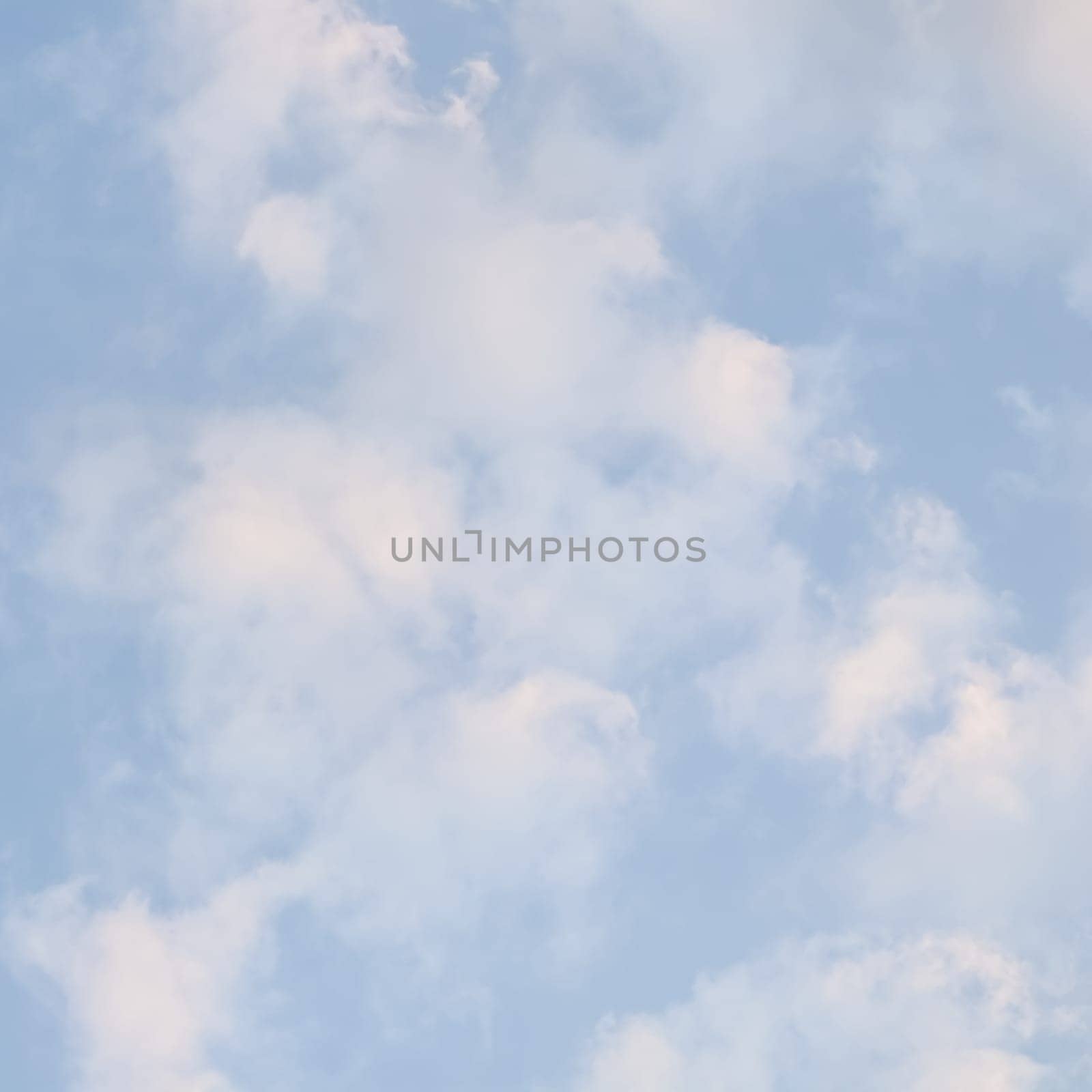 Background of blue sky with white clouds. Natural backdrop