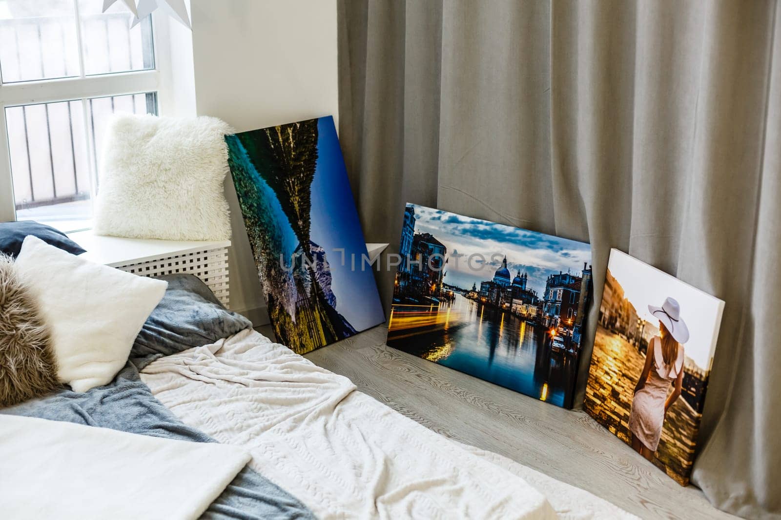 Canvas print in the room. Photo with gallery wrap method of canvas stretching on stretcher bar. Interior decor.