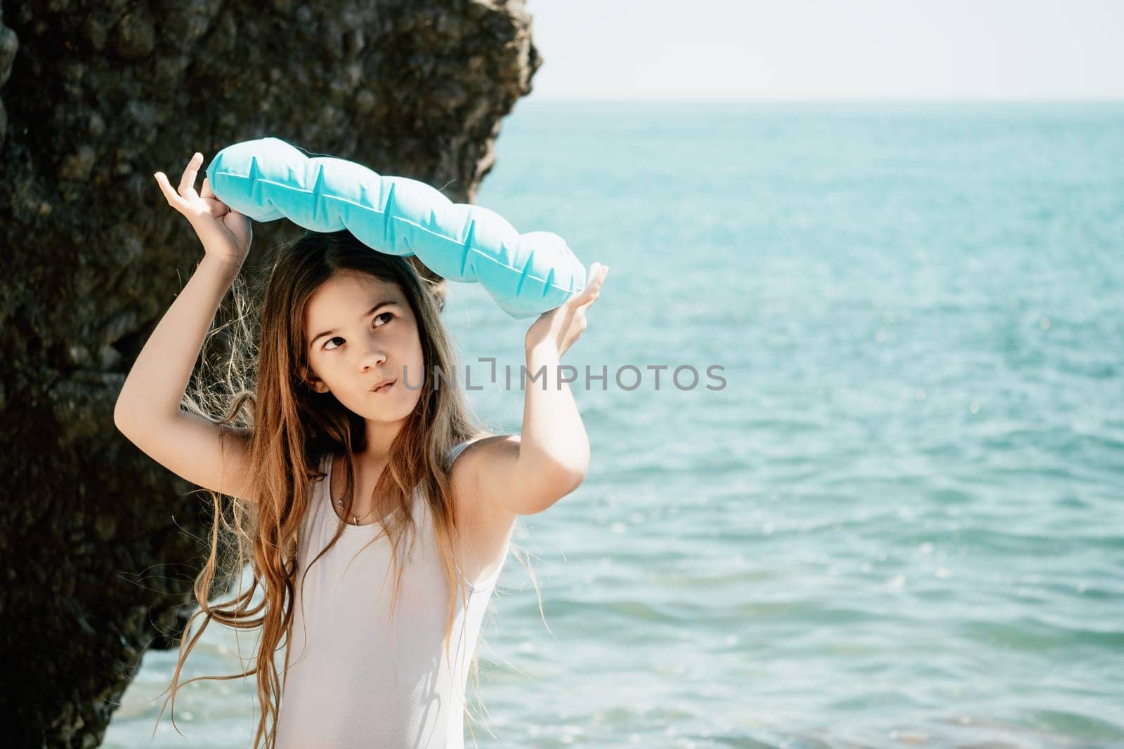 Silhouette mother and daughter doing yoga at beach. Woman on yoga mat in beach meditation, mental health training or mind wellness by ocean, sea