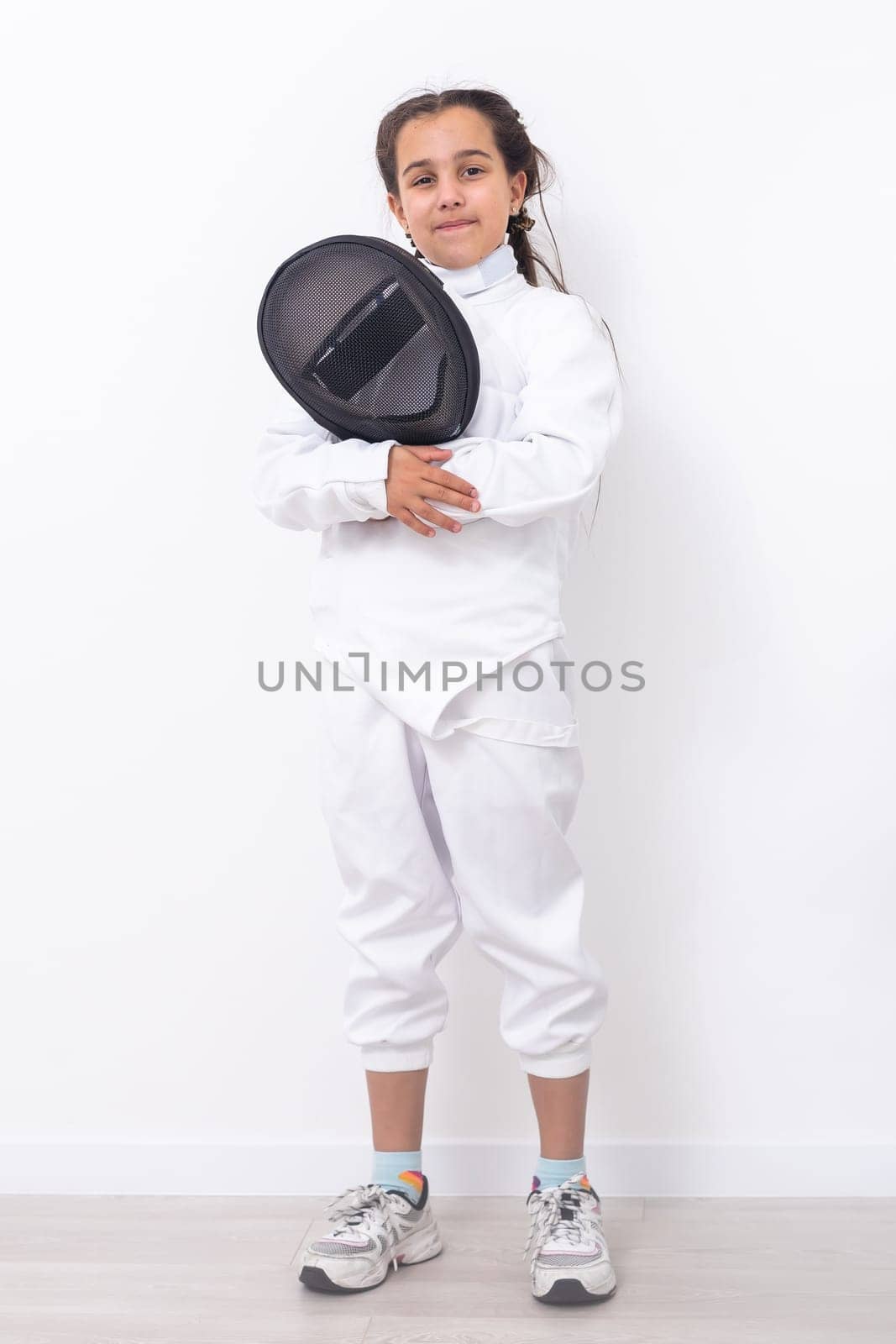 little girl in a fencing suit by Andelov13