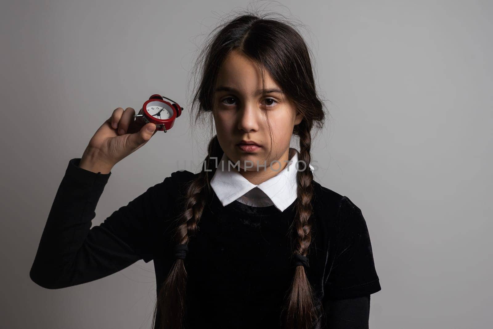 Wednesday Addams. Gothic girl with alarm clock by Andelov13