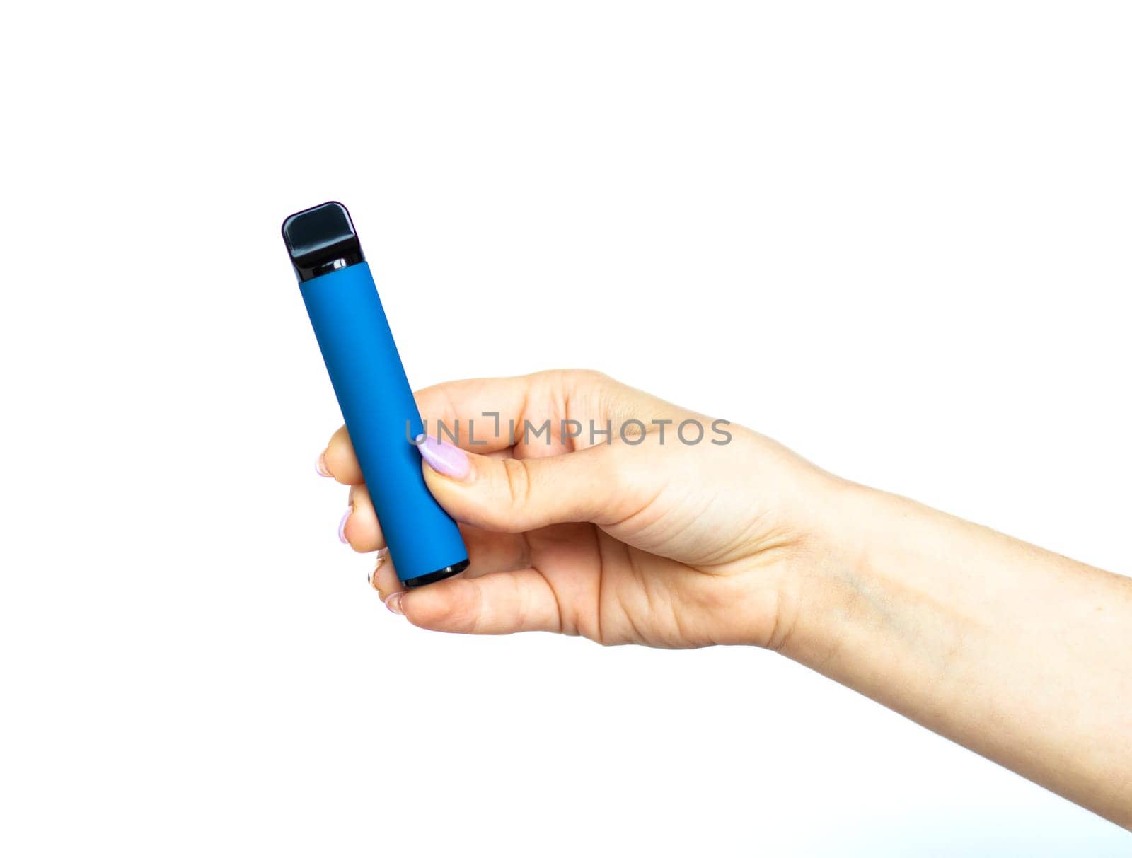 Female hand holds electronic cigarette on a white background. Disposable electronic cigarette. concept of modern smoking, vaping and nicotine. copyspace. Alternative way of smoking vaping device