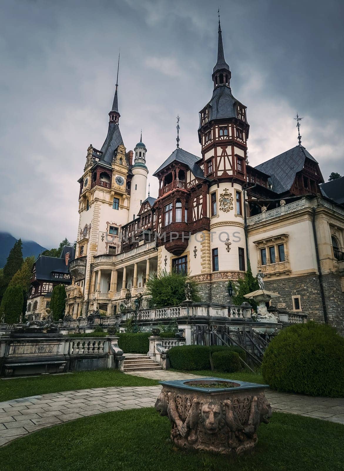 Peles Castle in Sinaia, Romania. Famous Neo-Renaissance palace of the royal family located in the heart of Carpathian mountains. by psychoshadow