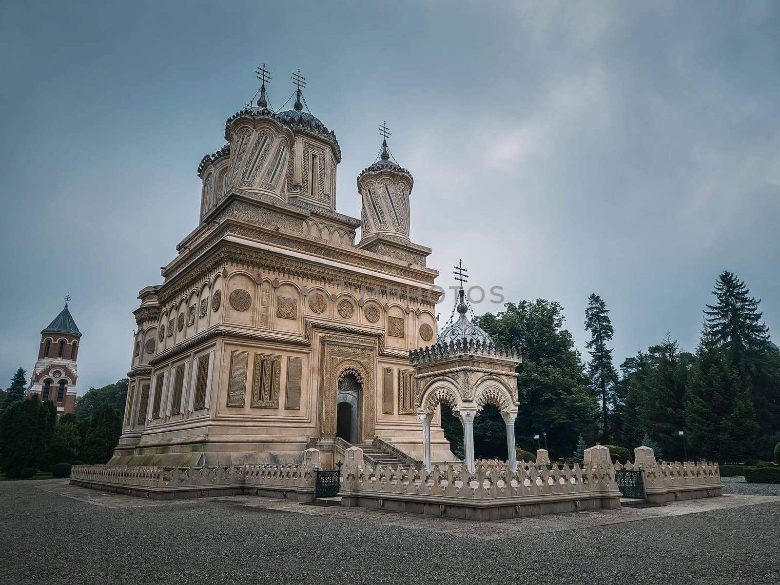 Curtea de Arges old Christian Orthodox monastery in Romania. Beautiful Cathedral facade and architectural details from the legend of Manole craftsman