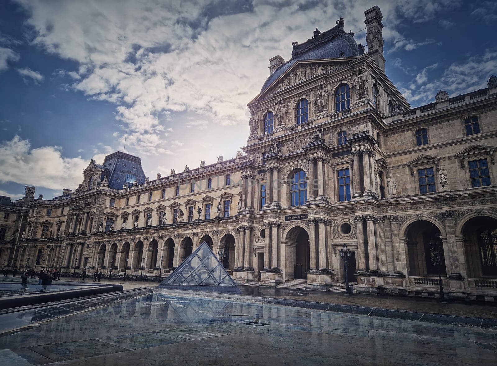 Outdoors view to the Louvre Museum in Paris, France. The historical palace building