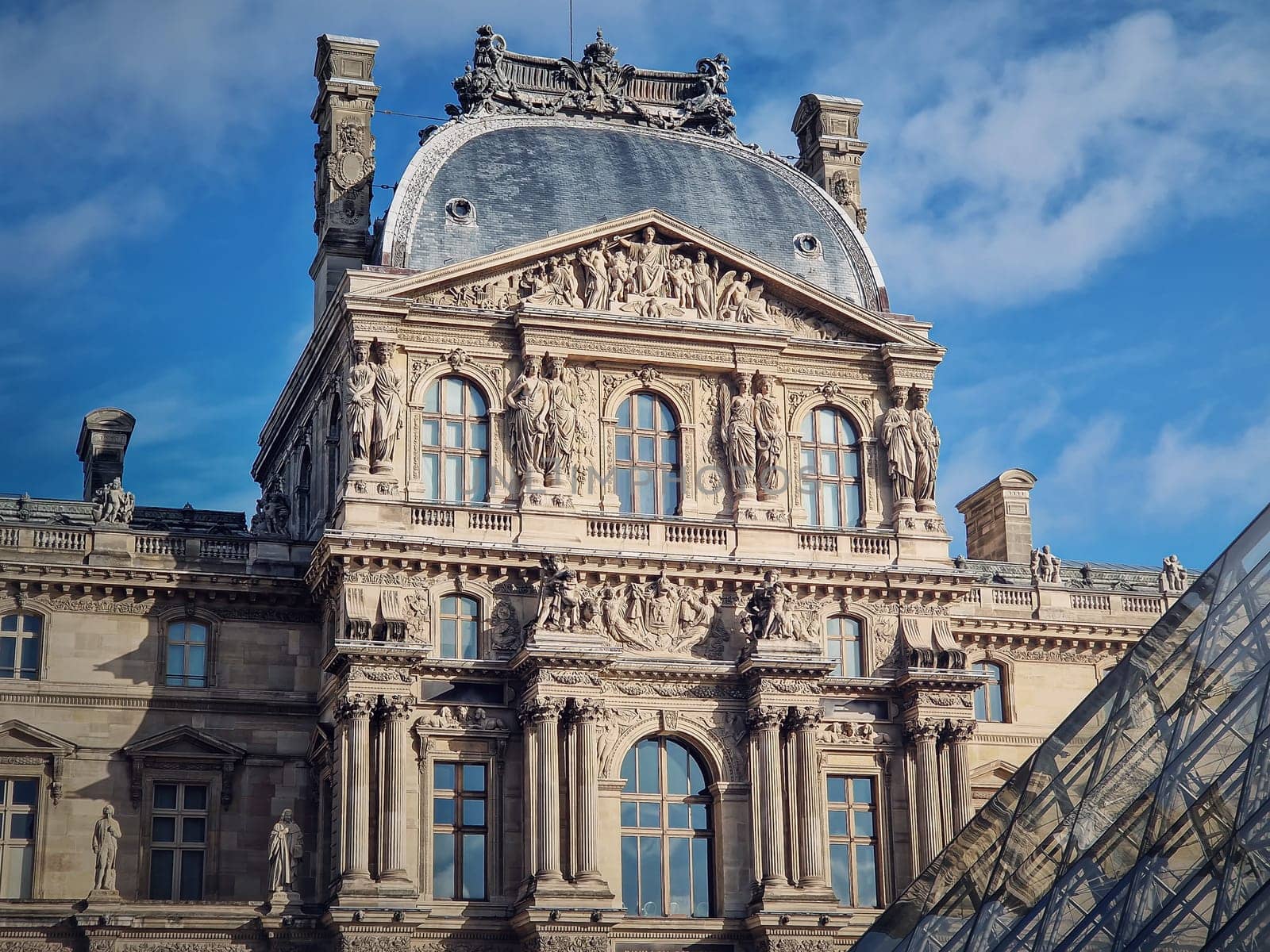 Closeup Louvre building, outdoors facade view of the famous museum palais in Paris, France by psychoshadow