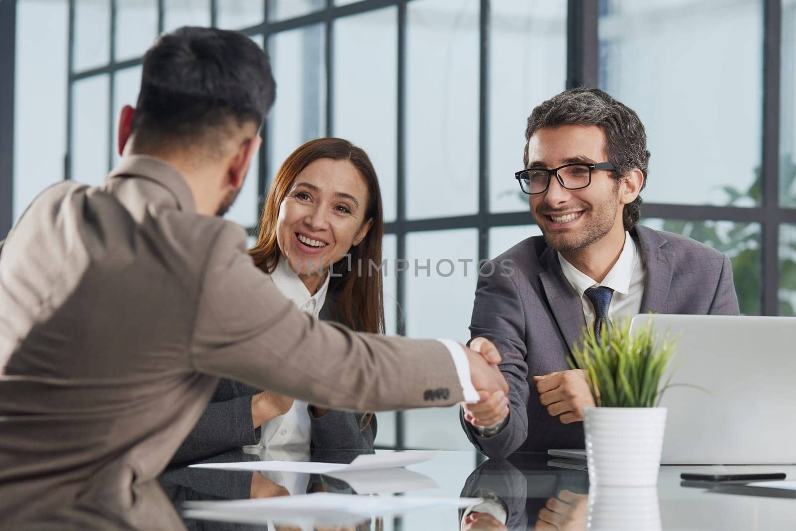professional group of office workers discussing project