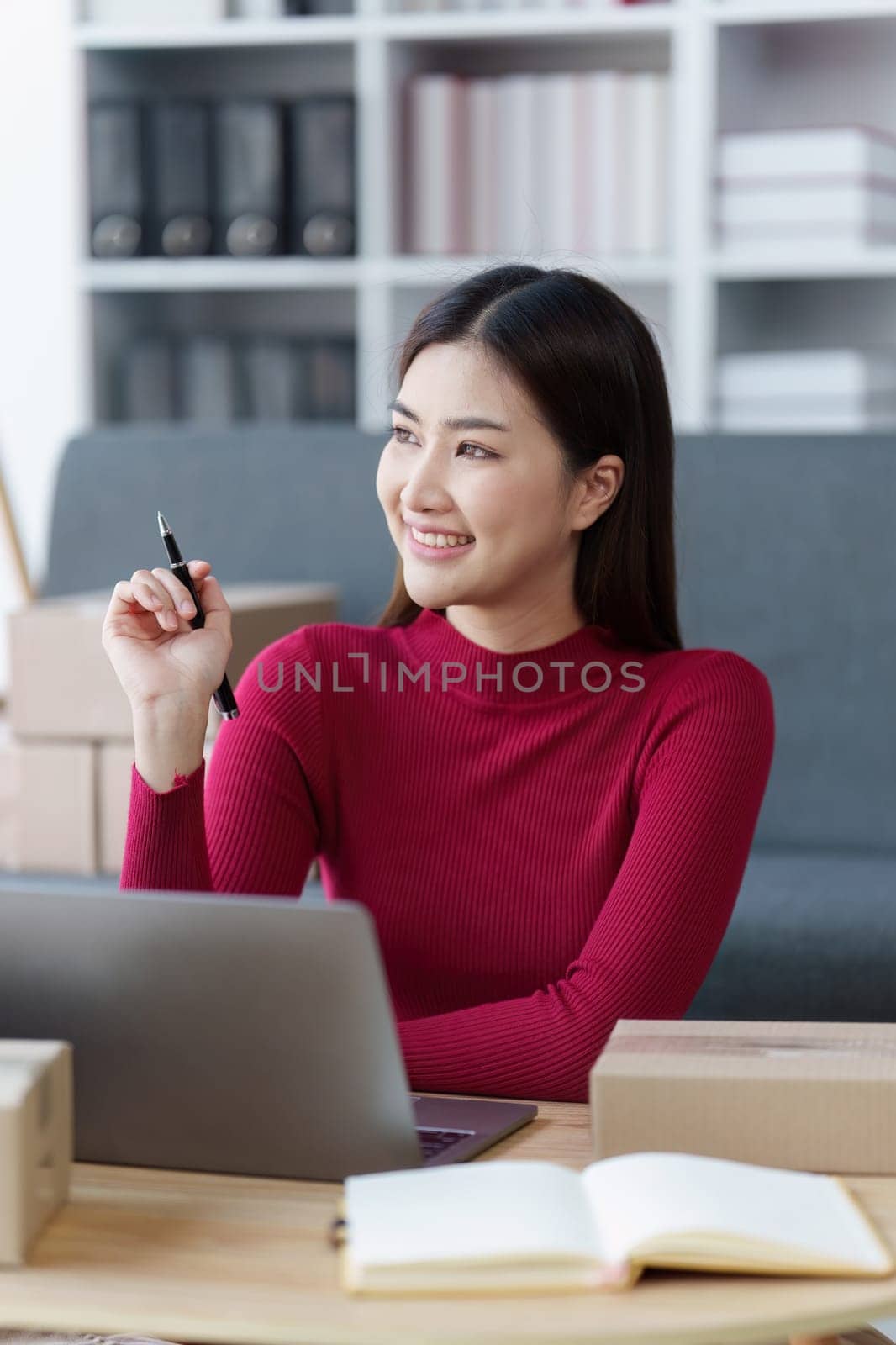 Small businesses SME owners female entrepreneurs check online orders to prepare to pack the boxes, sell to customers, sme business ideas online.