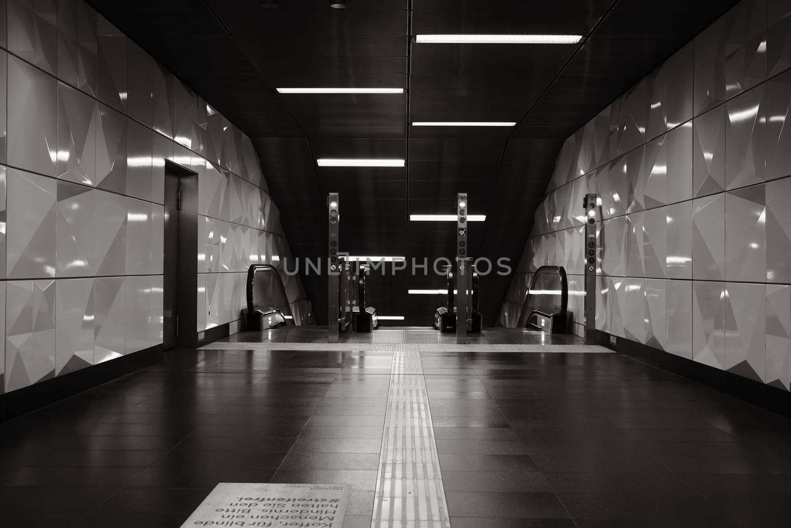 Grayscale shot of a subway station Heinrich-Heine Allee in Duesseldorf, Germany