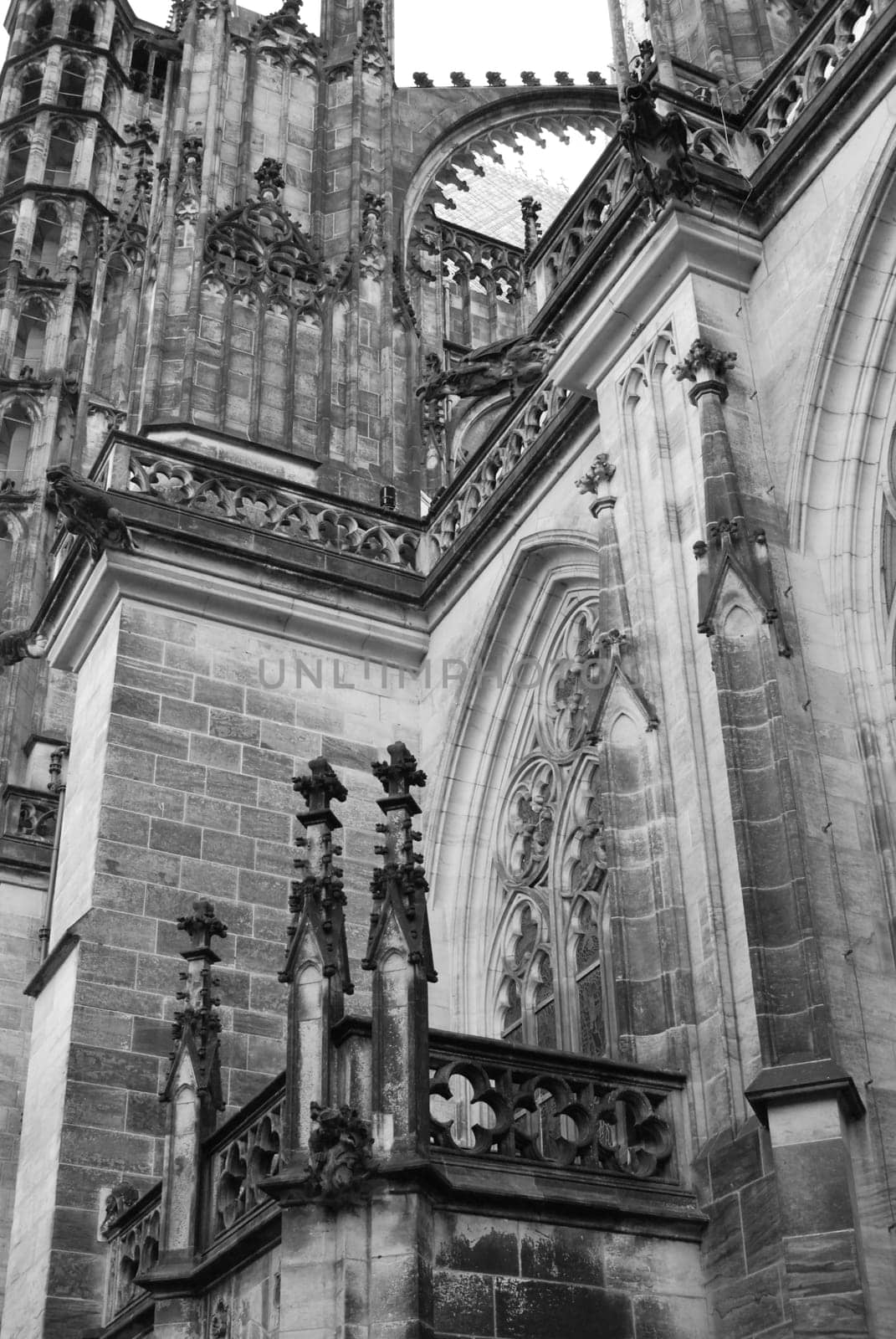 Vertical greyscale shot of the St. Vitus Cathedral at Prague Castle in Prague, Czech Republic