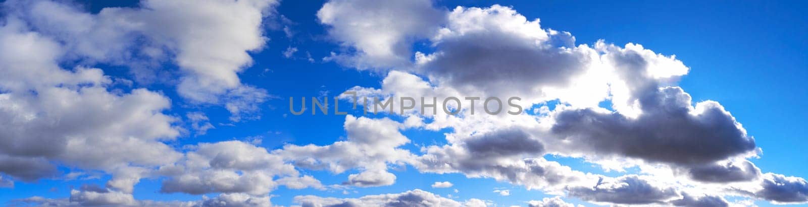 Blue sky and white clouds, widescreen panorama