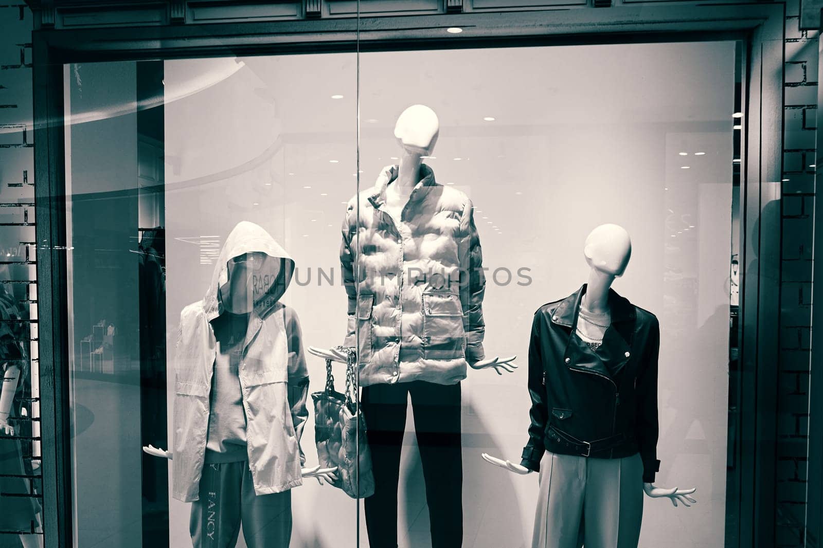 Mannequins in the window of a fashion store