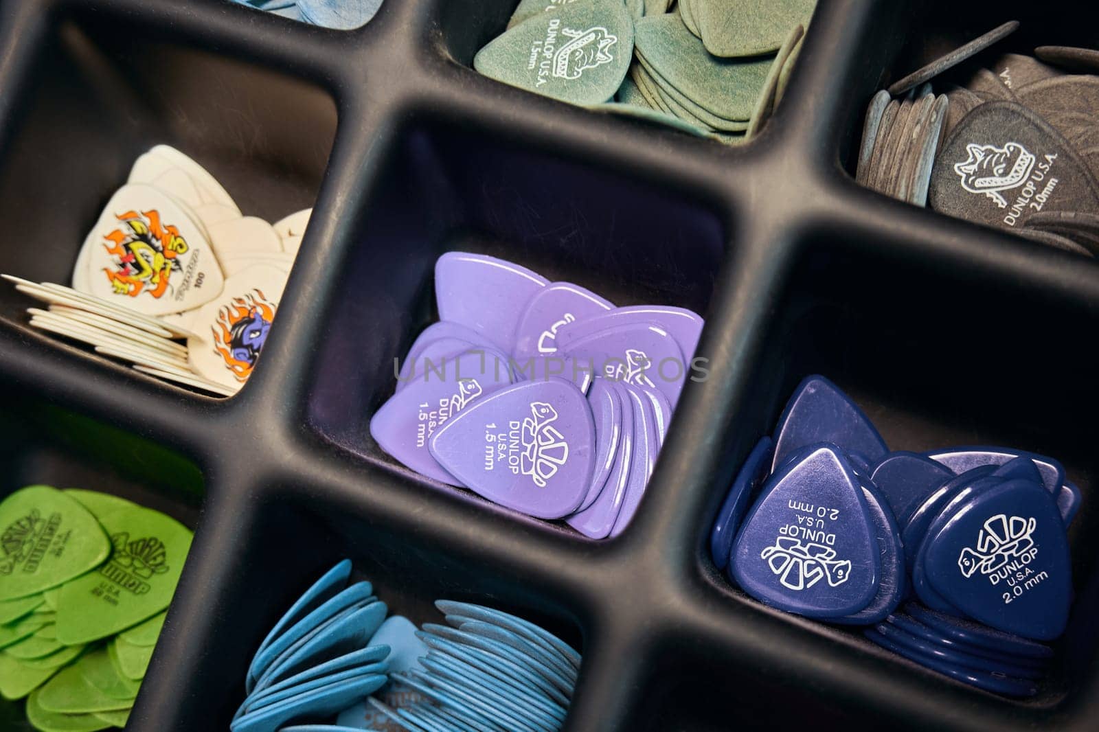 Ryazan, Russia - October 9, 2022: Guitar picks in a store close up. Guitar accessories