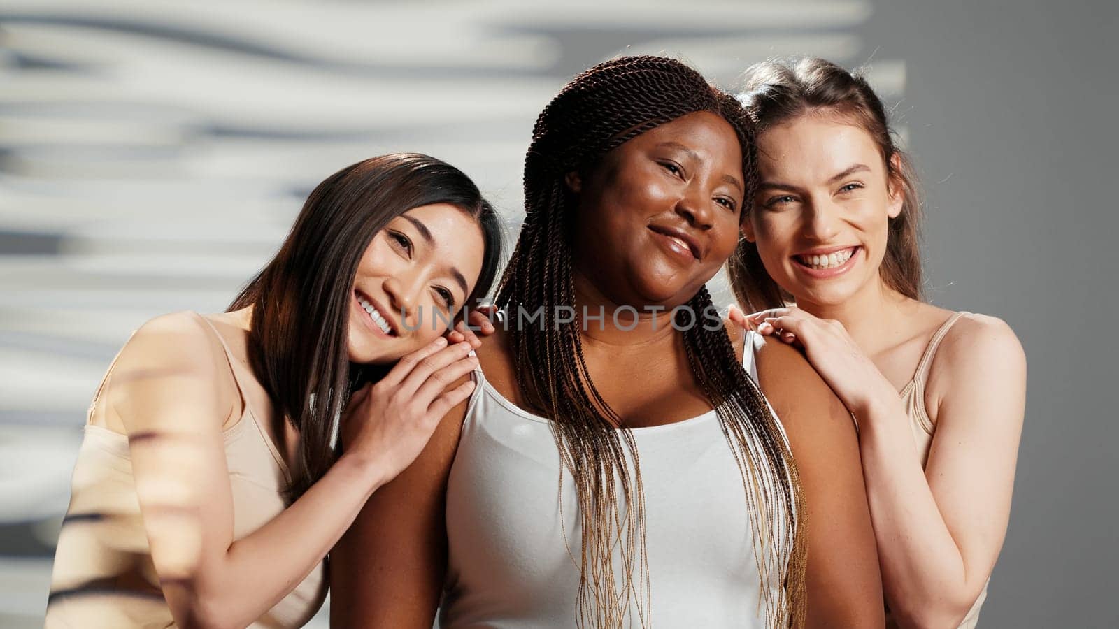 Multiethnic group of women promoting body positivity by DCStudio