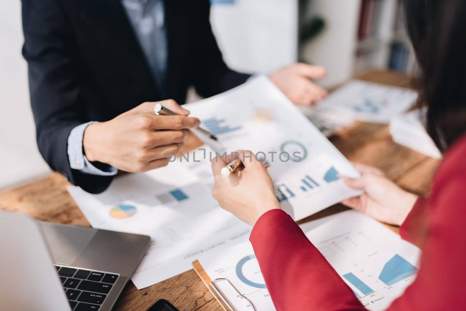 startup business, business advisor leadership for planning finance investment teamwork paperwork audit and discussing marketing, profit, budget of company in meeting room. by Manastrong