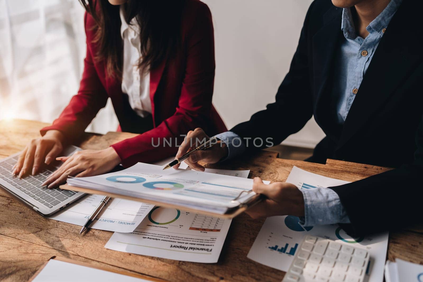 startup business, business advisor explaining strategy for planning finance investment teamwork paperwork audit and discussing marketing, profit, budget of company in meeting room