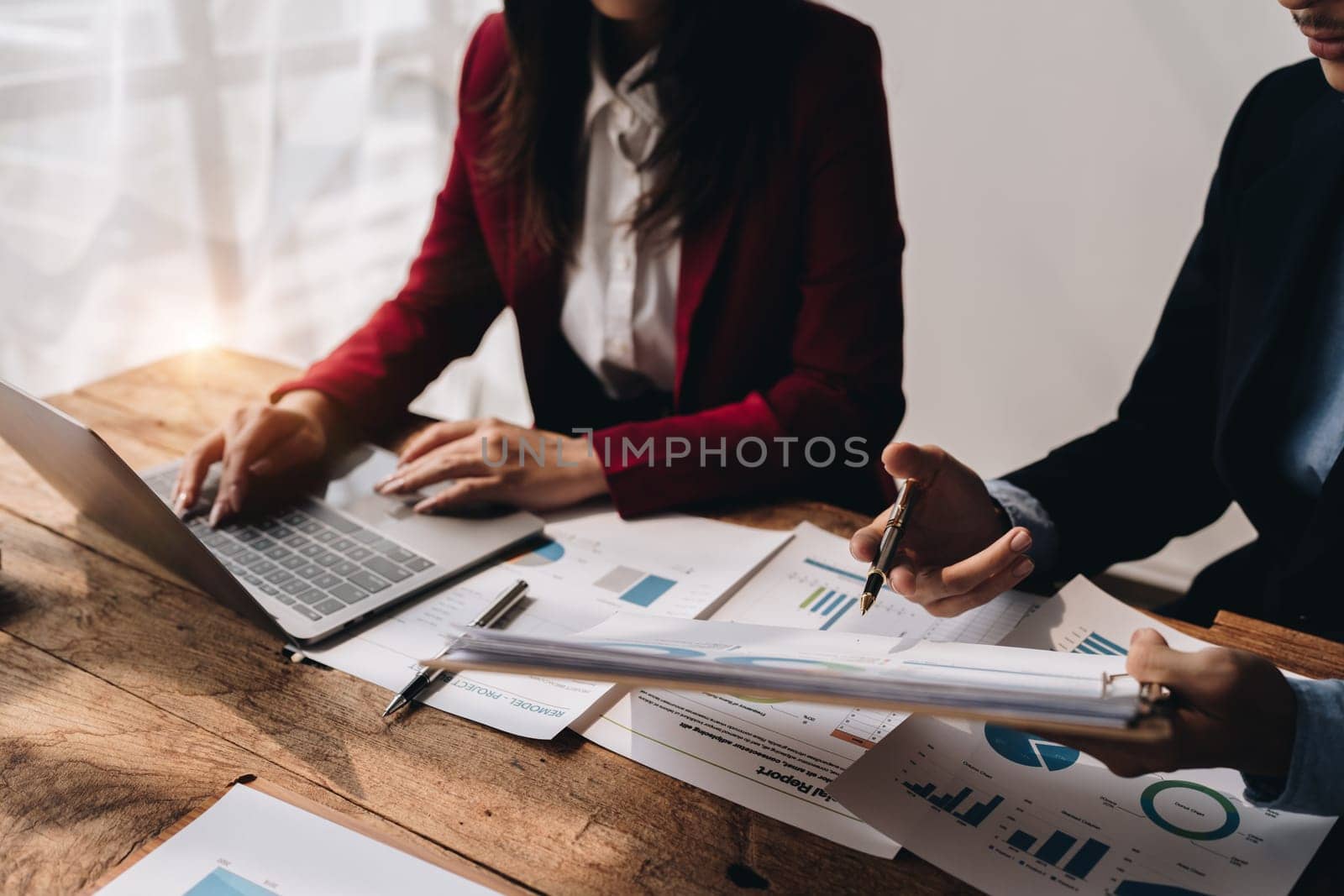 startup business, business advisor explaining strategy for planning finance investment teamwork paperwork audit and discussing marketing, profit, budget of company in meeting room. by Manastrong