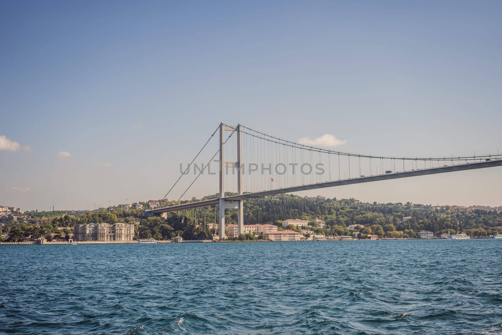 Bosphorus bridge on a summer sunny day, view from the sea, Istanbul Turkey.