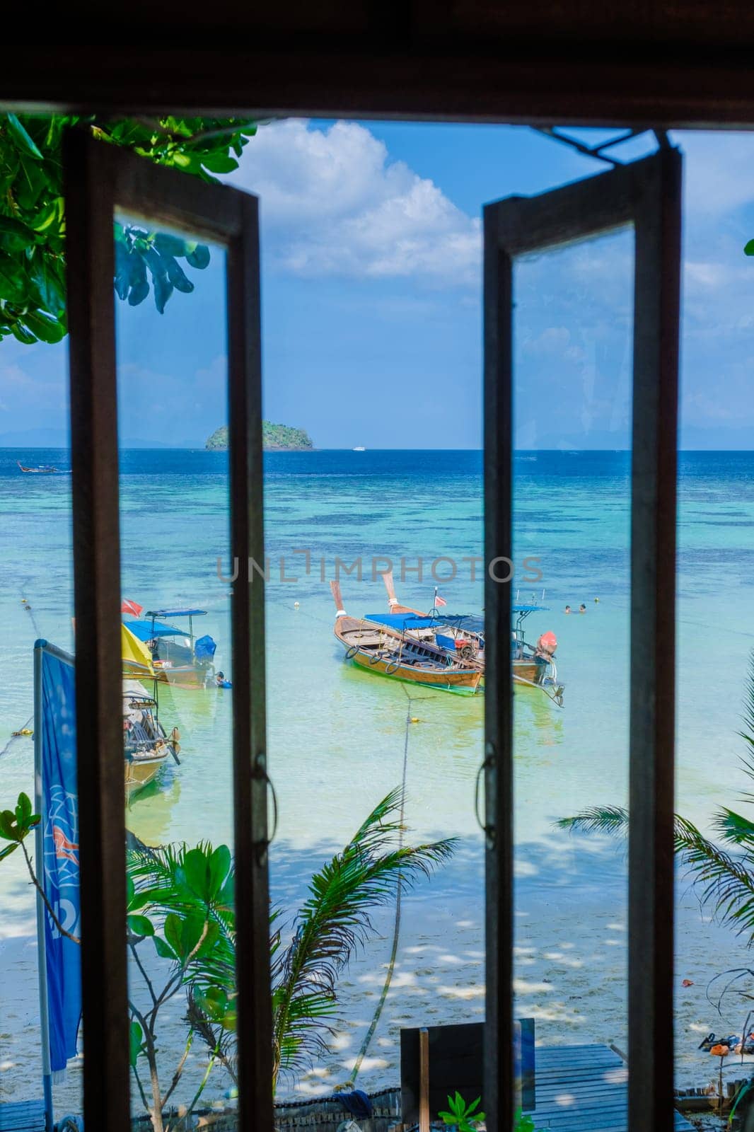 Koh Lipe Island Southern Thailand view from the window with turqouse colored ocean and white sandy beach at Ko Lipe.