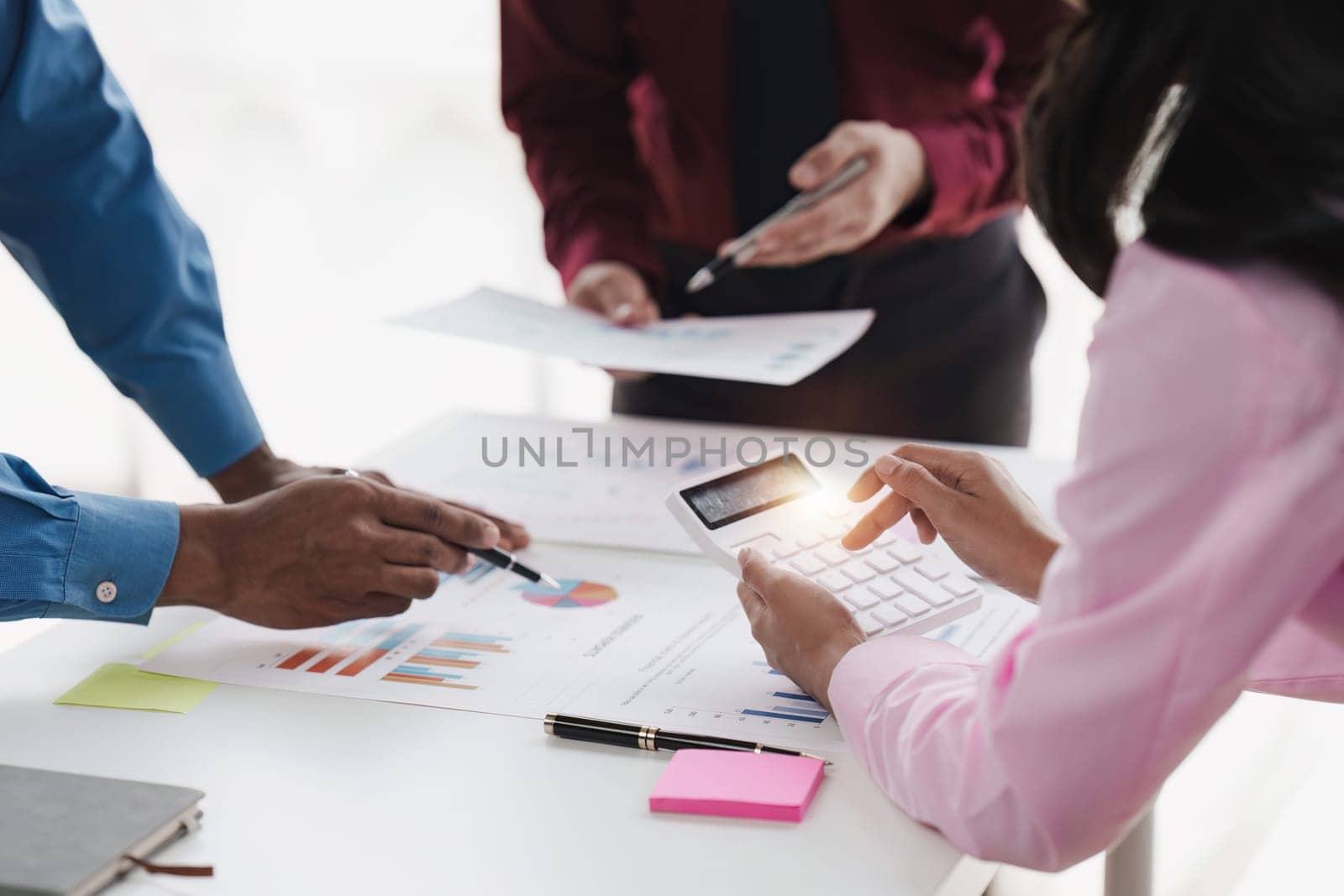 Group of Business People Meeting analysis financial plan, discussion, research with paperwork at office, accounting concept.