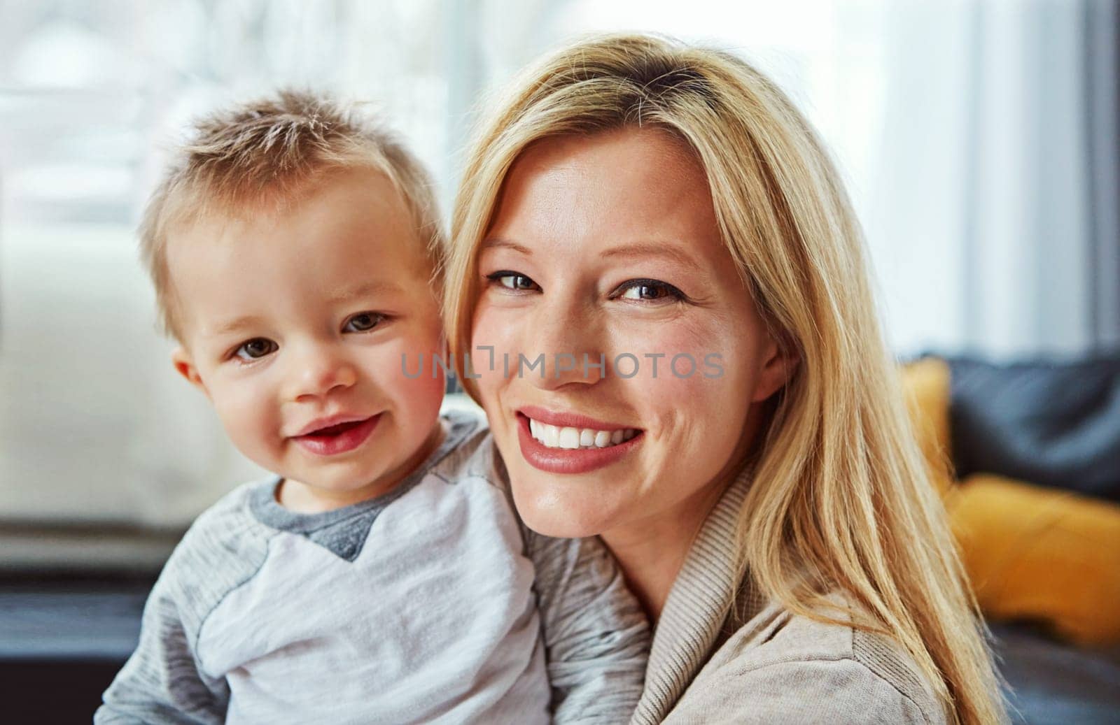 I love my role as a Mother. Closeup shot of a young woman spending the day at home with her little boy