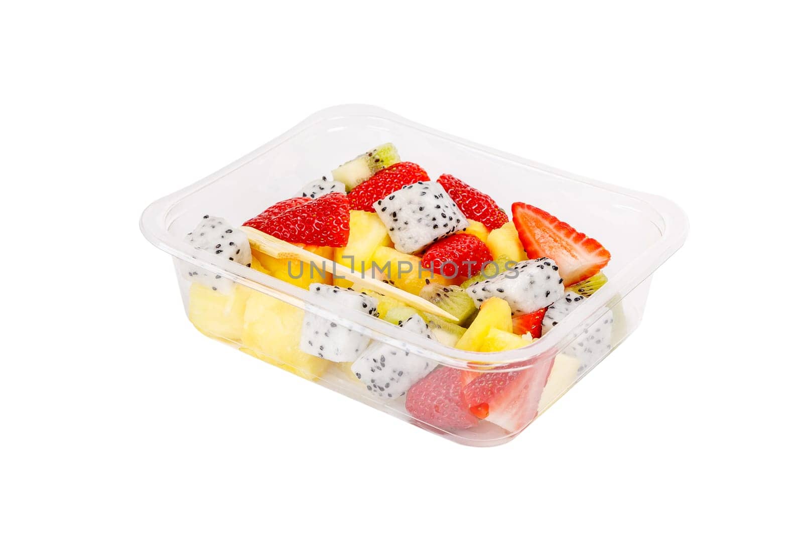 Fruit salad of pineapple, strawberry, kiwi and pitahaya in a plastic container on a white background. High quality photo