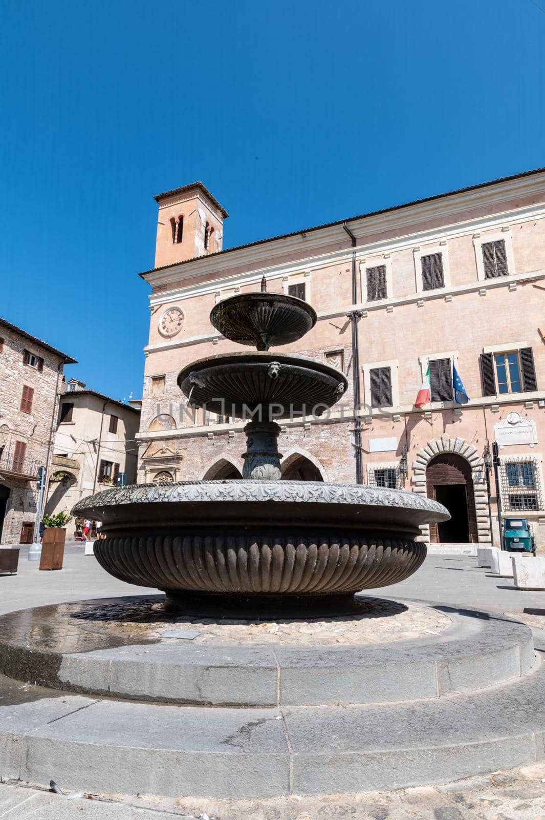 square of republic and its fountain in spello by carfedeph