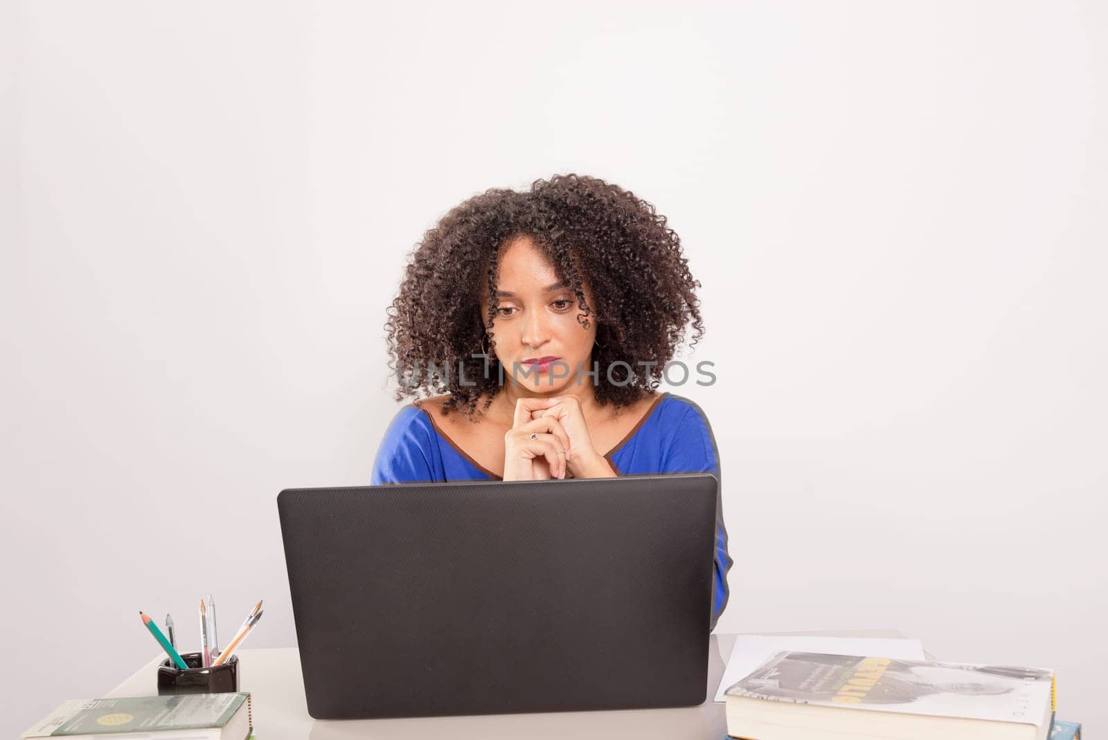 Young pretty businesswoman working with laptop. Home office. isolated on white background