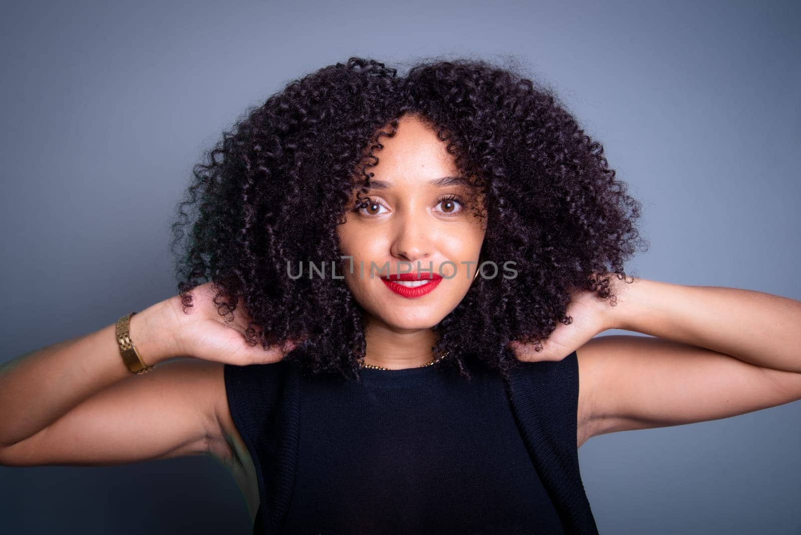 Close-up portrait of beautiful young woman with black hair. studio portrait