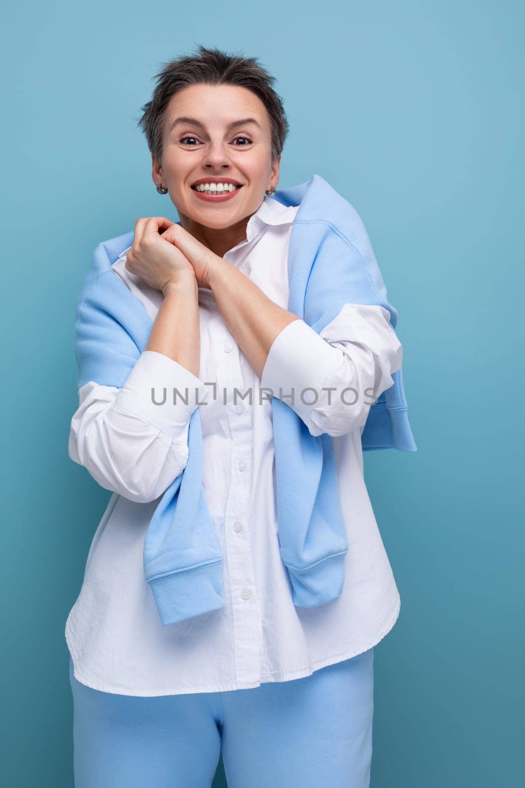 portrait of self-sufficient charismatic young millennial woman with short haircut by TRMK