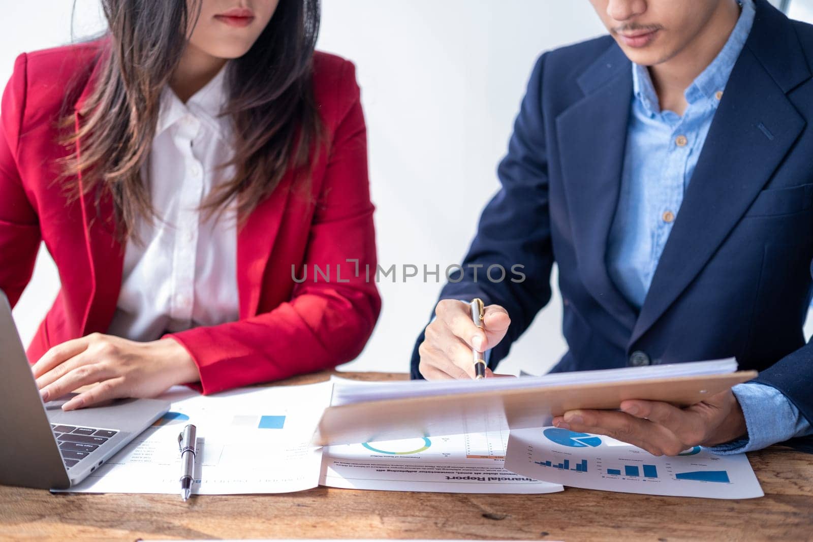 Group of young coworkers working together, business team work as team work, smart businessman and women brain storm idea knowledge information discussion thinking. High quality photo