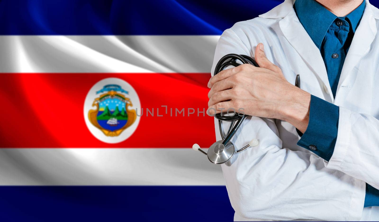 Doctor with stethoscope on Costa Rica flag. Health and care with flag of Costa Rica. Costa Rica national health concept by isaiphoto