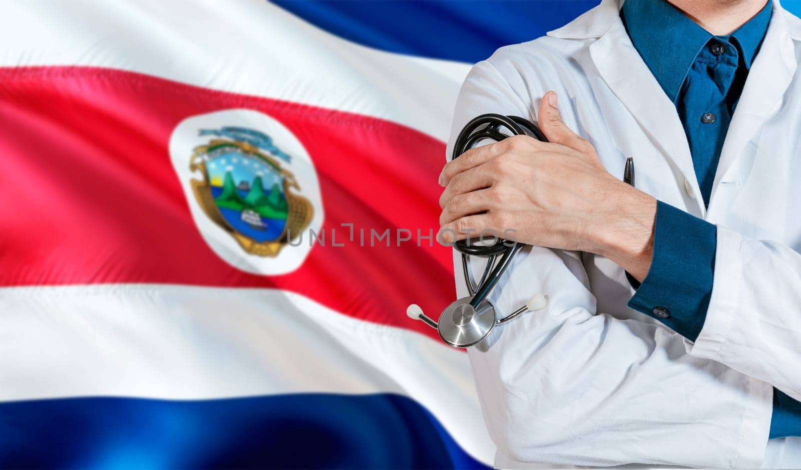 Health and care with flag of Costa Rica. Costa Rica national health concept, Doctor with stethoscope on Costa Rica flag by isaiphoto