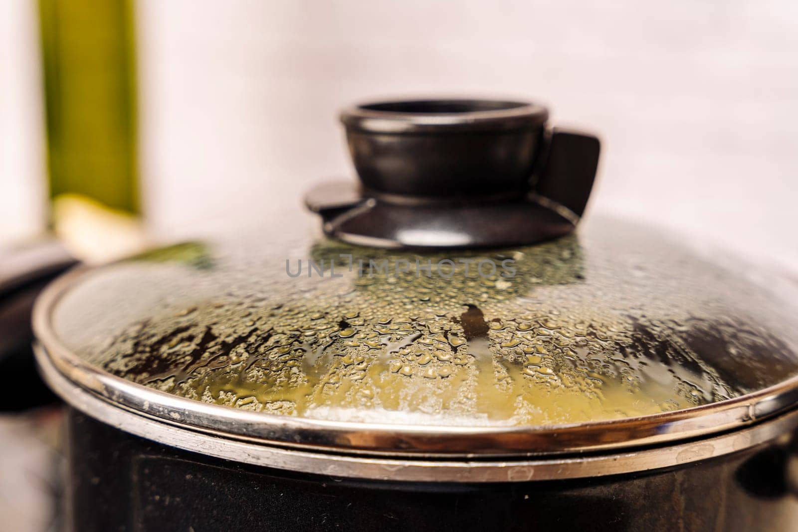 the misted lid of a pot of boiling water by audiznam2609