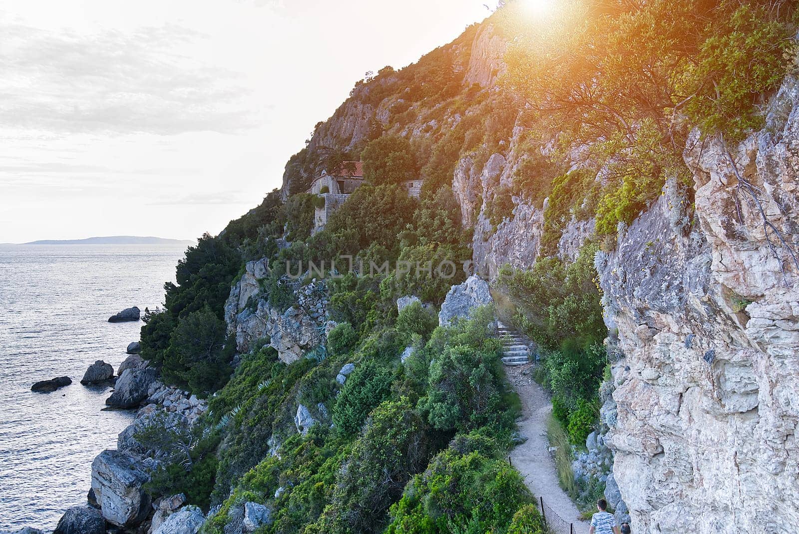 way to small church sanctuary of Blessed Mary of Conception - Gospe od Prizidnice, upright rock, high over sea. Trogir, Croatia