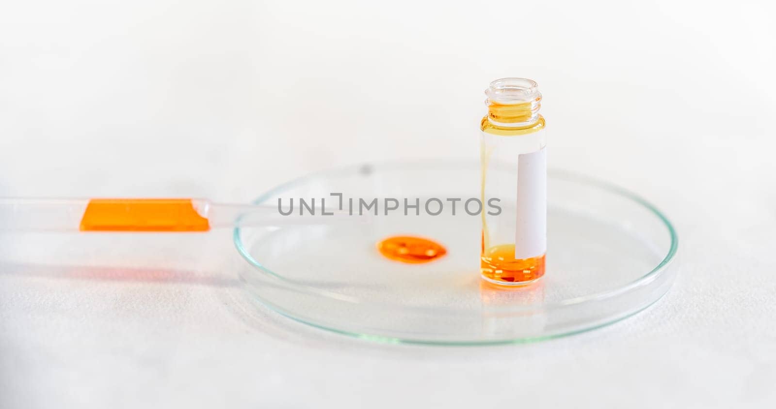 chemical sample in a research laboratory on a glass dish.