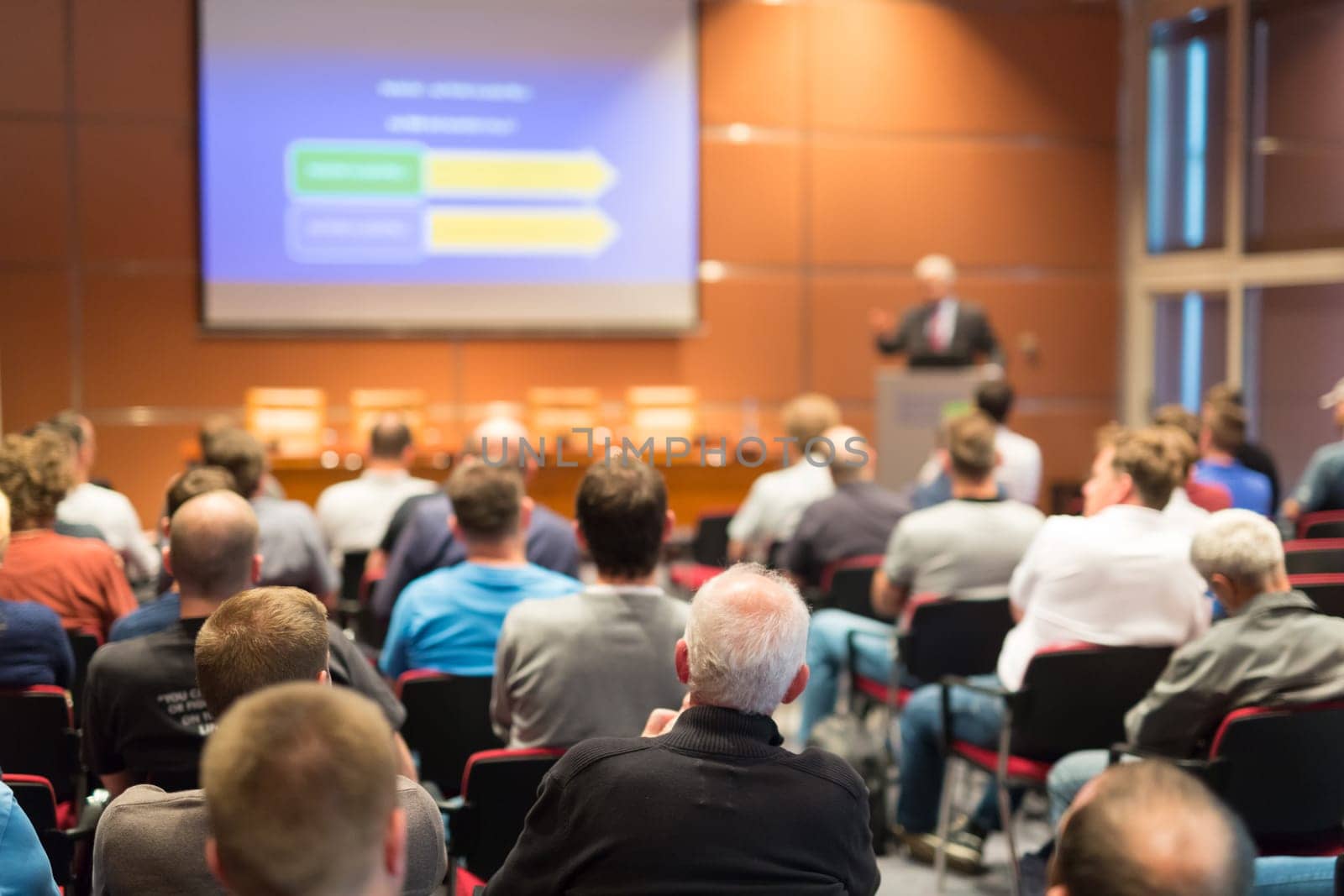 Speaker Giving a Talk at Business Meeting. Audience in the conference hall. Business and Entrepreneurship.