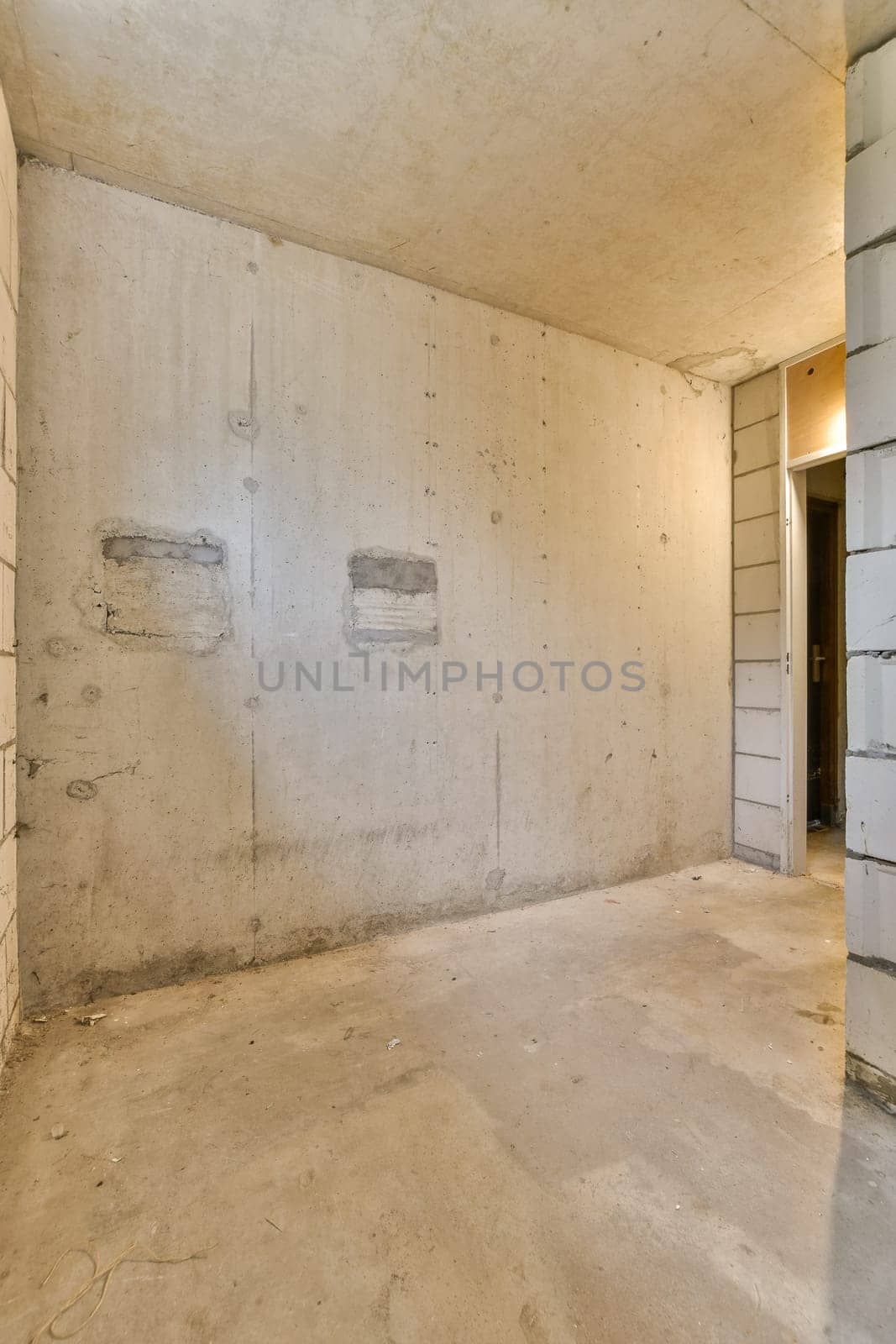 an unfinished room that is being used as a kitchen and dining area for the new apartment building to be built