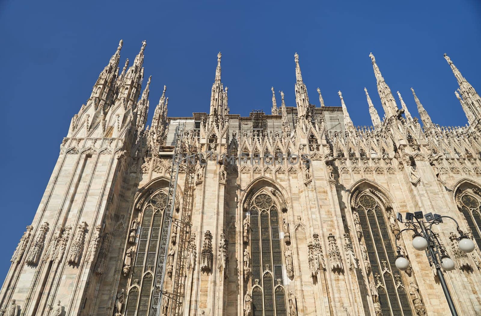 Milan, Italy - February 15, 2023: Milan Cathedral in Piazza Duomo during the day, Milan. Cathedral of the Duomo.