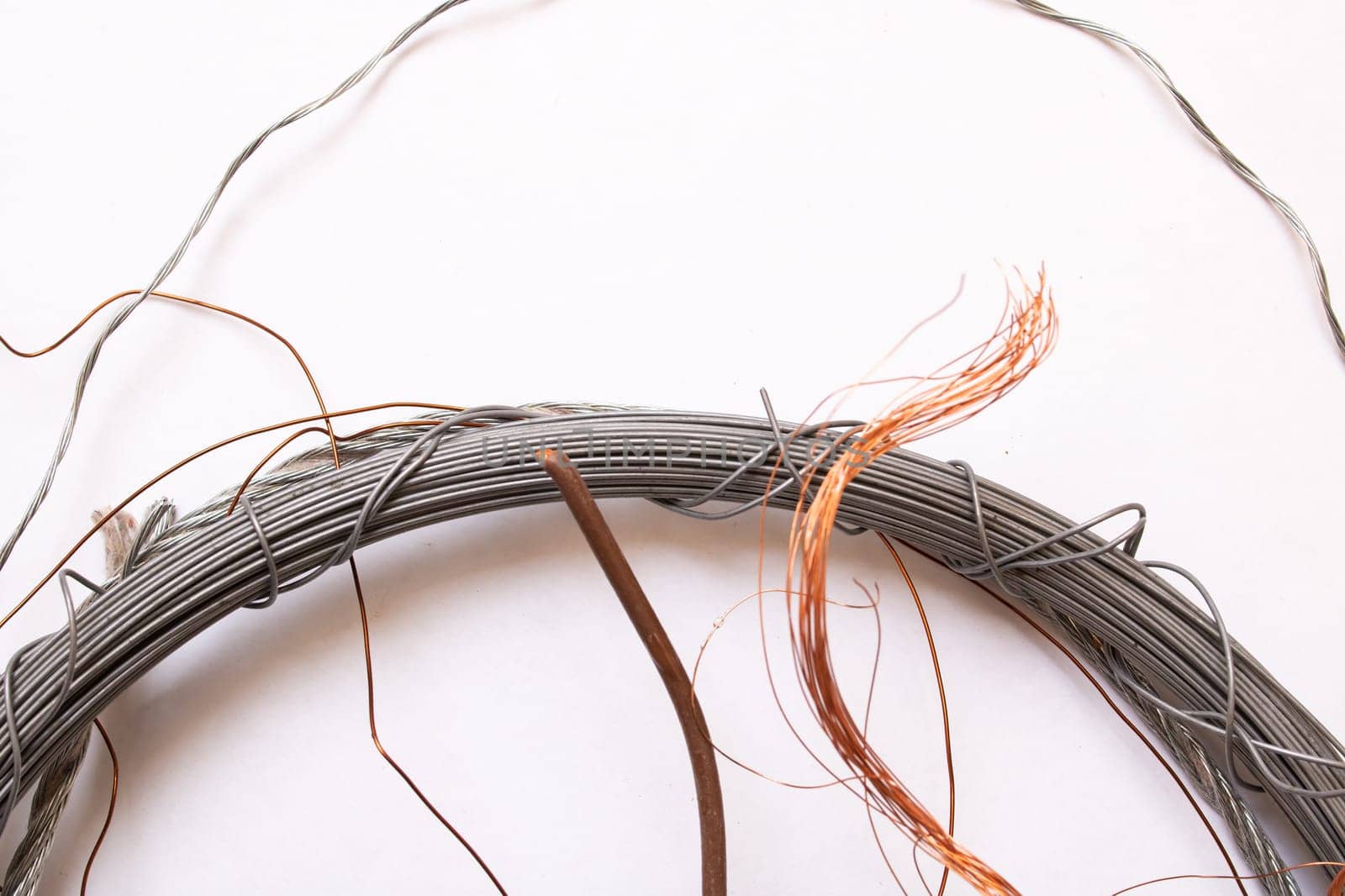 Large coil of wire on the table close up