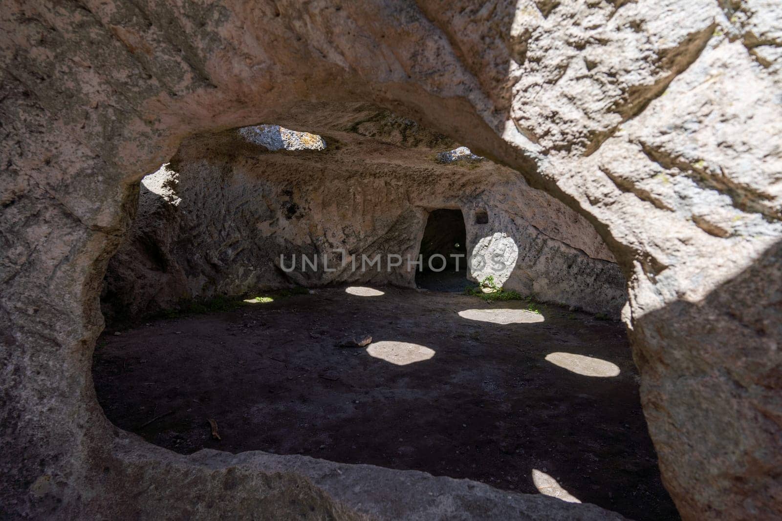Ancient cave city. Inside the cave, view from the window
