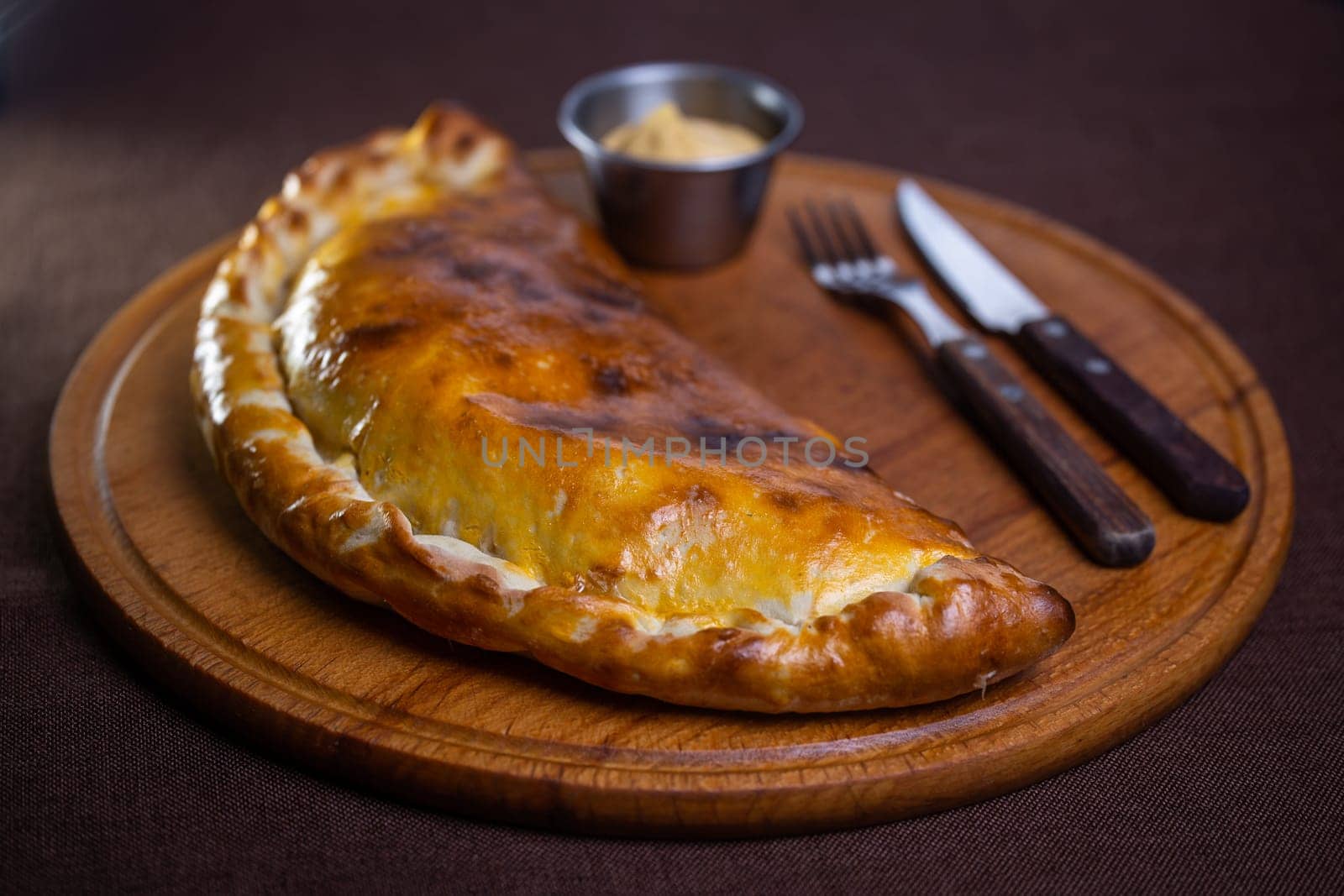 hot homemade pie on the table. pie with filling.