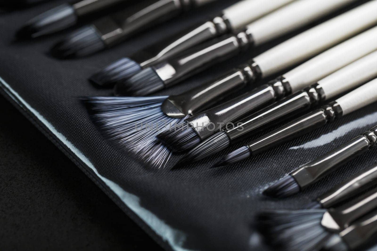 A set of art brushes for drawing on a black background, Close-up
