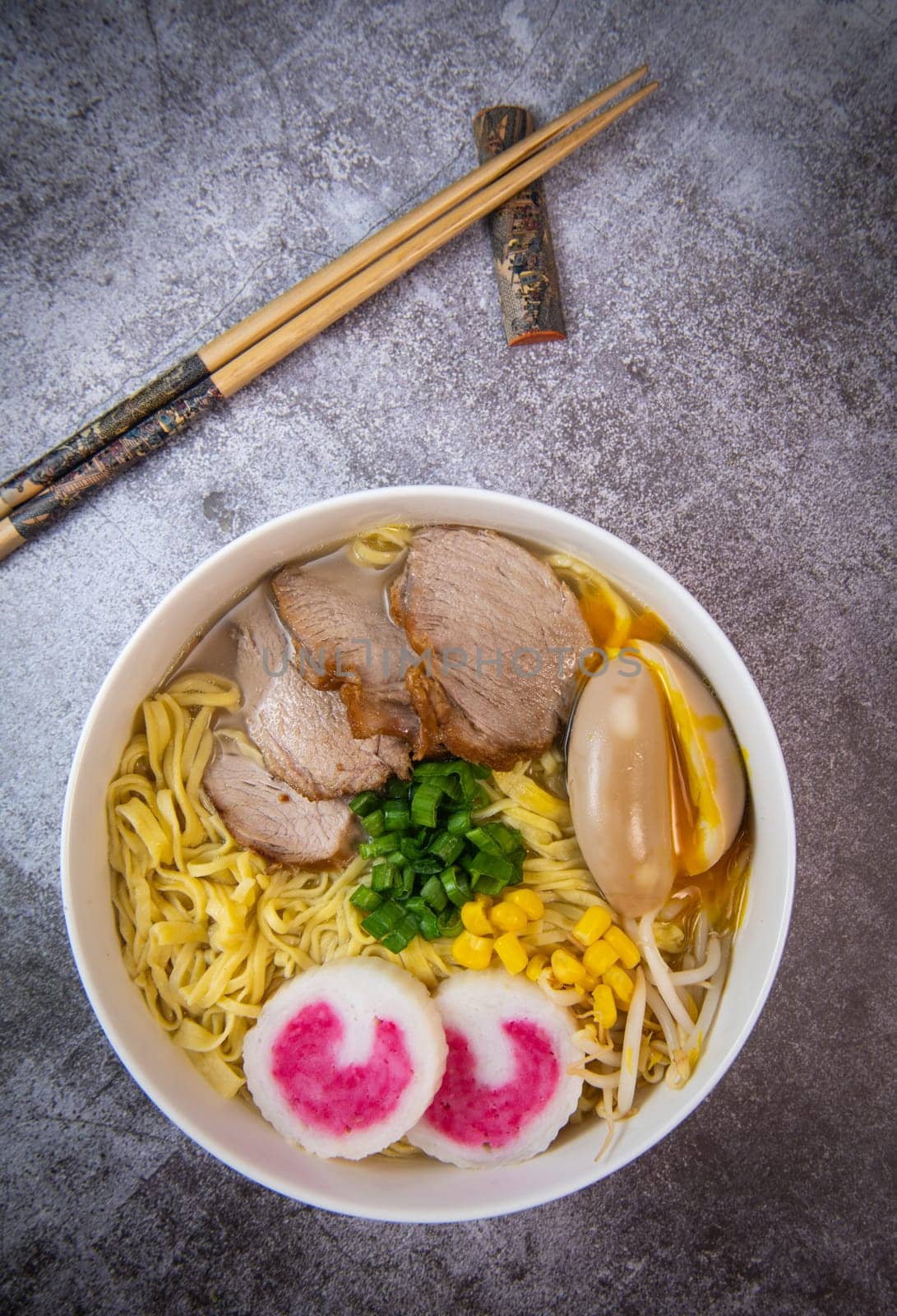 Fresh ramen noodles with garnish, pork tenderloin, eggs marinated in Mirin and soy sauce, bean sprouts, corn, nori leaf, spring onion, and homemade Narutomaki with codfish back, Hight quality