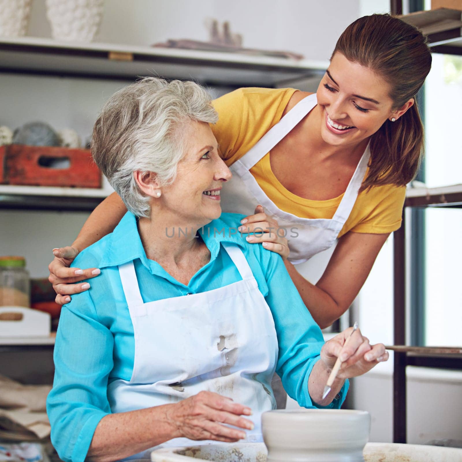 Happy are those who have hobbies. a senior woman making a ceramic pot at a pottery class