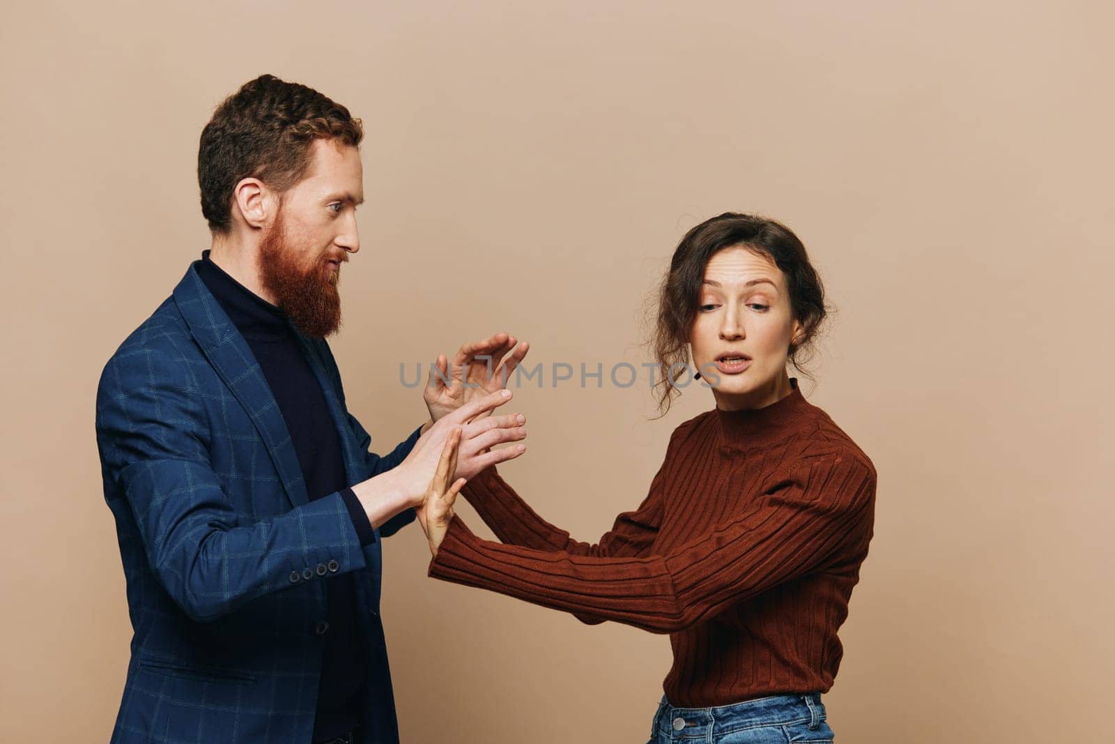Man and woman couple in a relationship quarrel, yelling, psychological violence in the family, problems in a real relationship between people. High quality photo