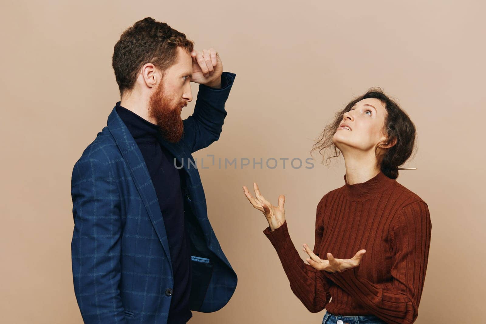 Man and woman couple in a relationship quarrel, yelling, psychological violence in the family, problems in a real relationship between people. High quality photo