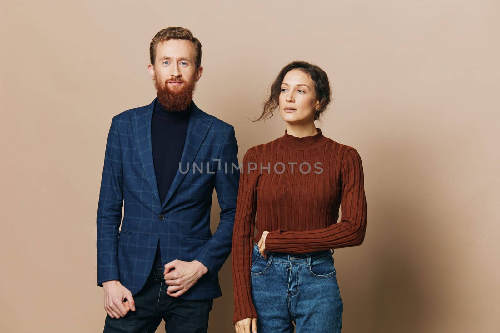 Man and woman couple in a relationship smile and interaction on a beige background in a real relationship between people by SHOTPRIME