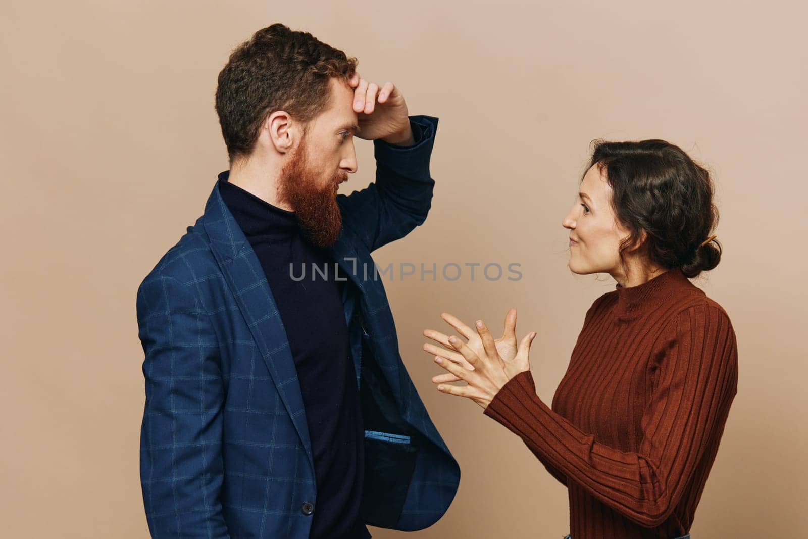 Man and woman couple in a relationship quarrel, yelling, psychological violence in the family, problems in a real relationship between people. High quality photo